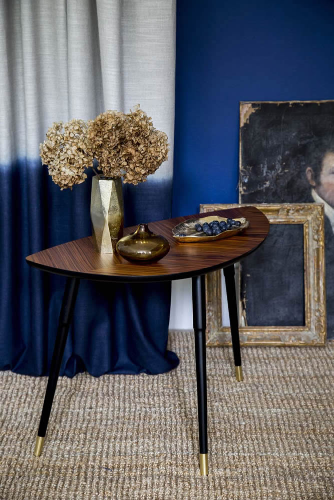 Contrast inky blue shades with twinkling copper accents
